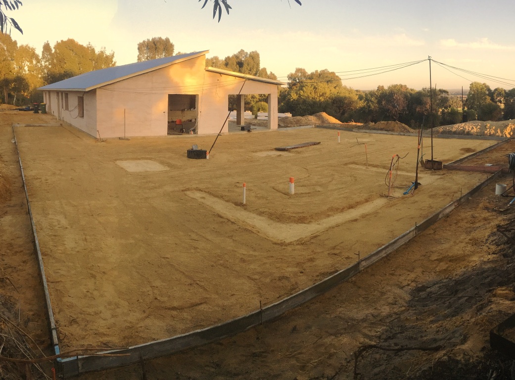  Filled, compacted, plumbing, electrics done, footings laid and levelled.  