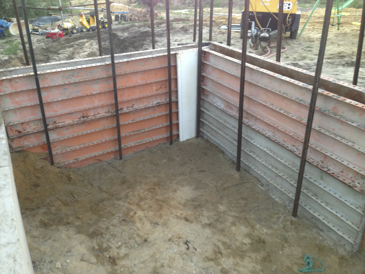  Filling in the 'pit' that was used for clean sand 